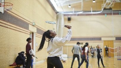A Student playing Badminton. St Helens college
