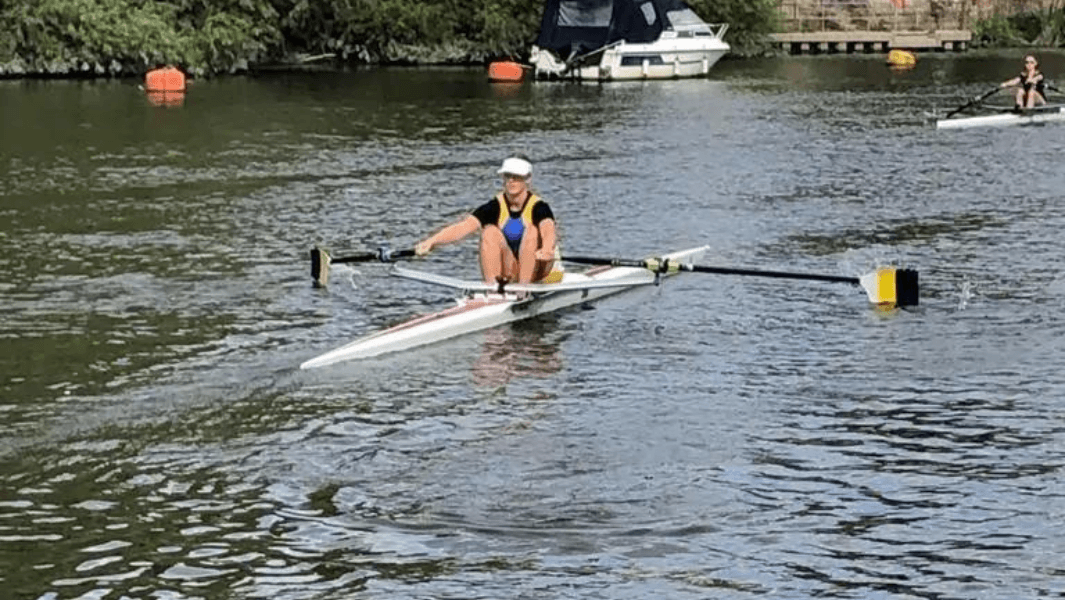 A Student on a row boat. st helens sixth form