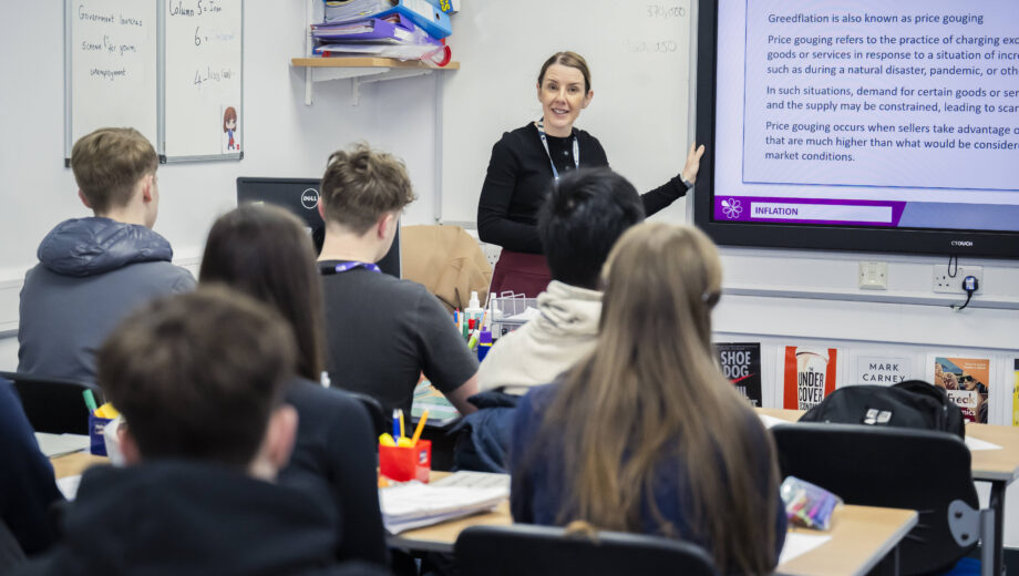 Classroom of students with a female teacher at the front