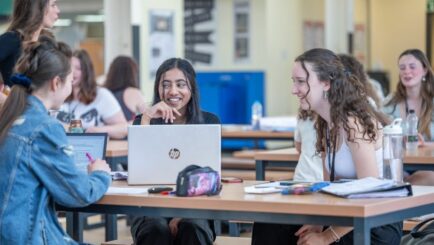 Students studying in canteen