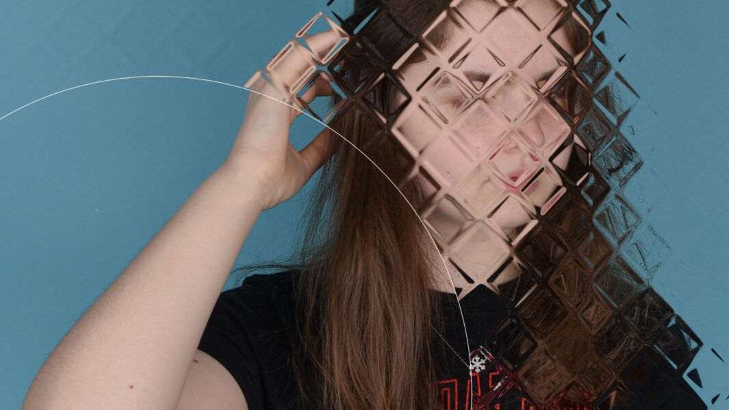 photography artwork of a girl with a pixilated face