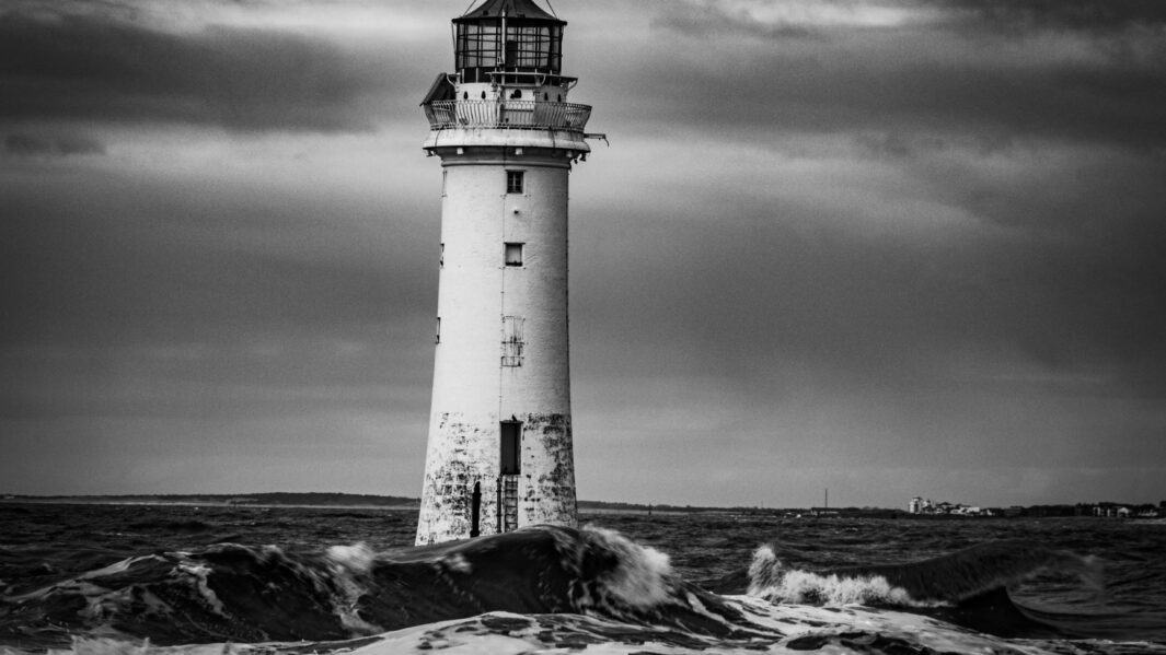 photography image of a lighthouse in black and white