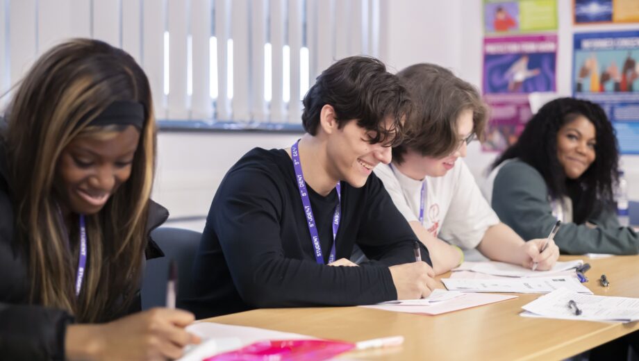 Students sat at desks in a classroom