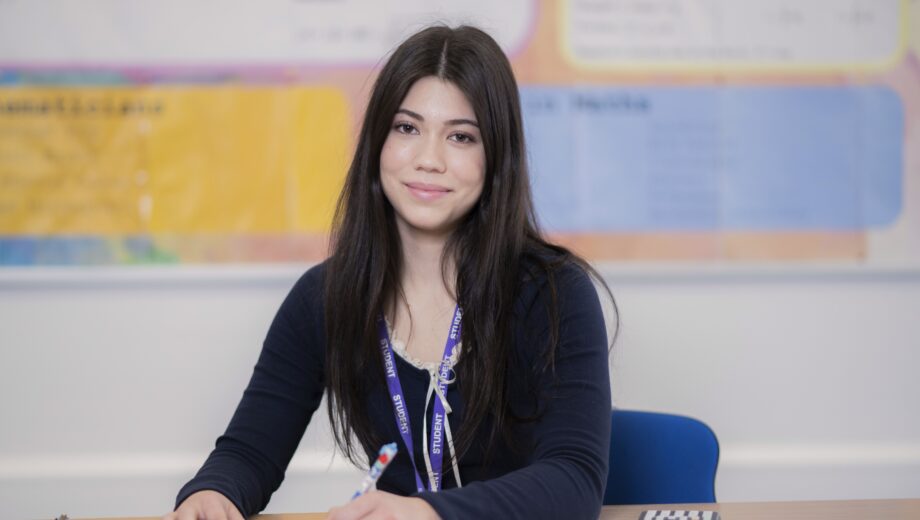 Female student sat in a Maths class