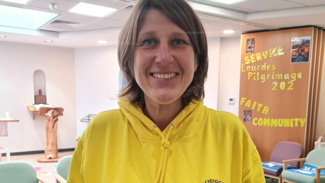 Female tutor in yellow jumper in Chaplaincy