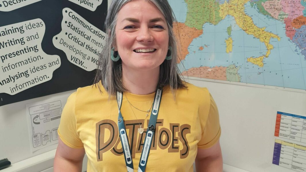 female tutor wearing yellow t shirt