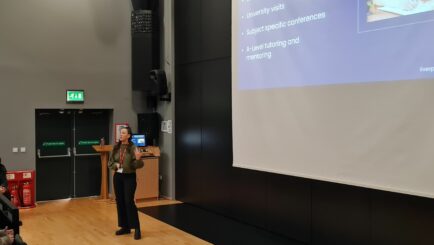 Ciara Rohan from uni of Liv delivering a talk in the Dalton Theatre. a level maths