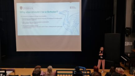 students int he Dalton theatre attending a talk