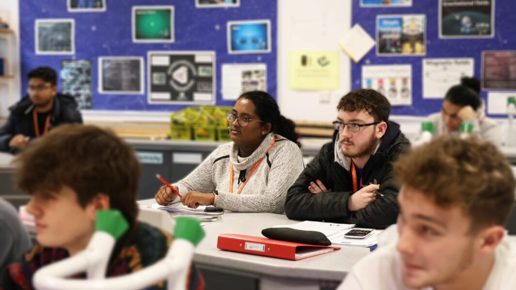 HE students working in a science lab at Carmel College