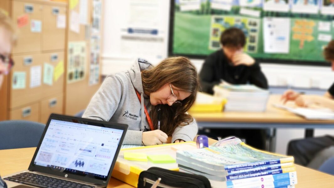 female HE students working in a Geography class