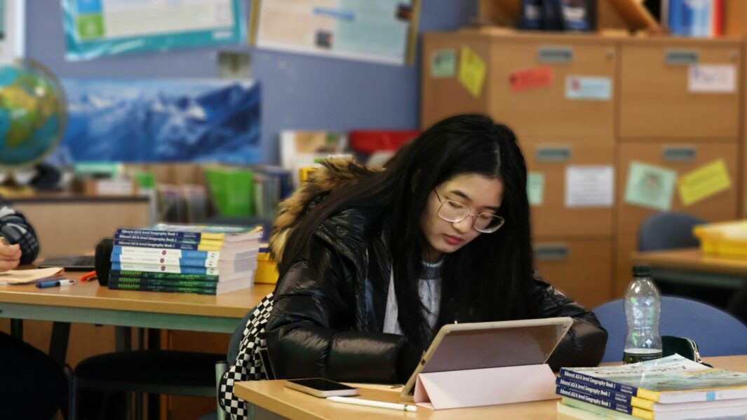 Female HE student working on an Ipad at Carmel