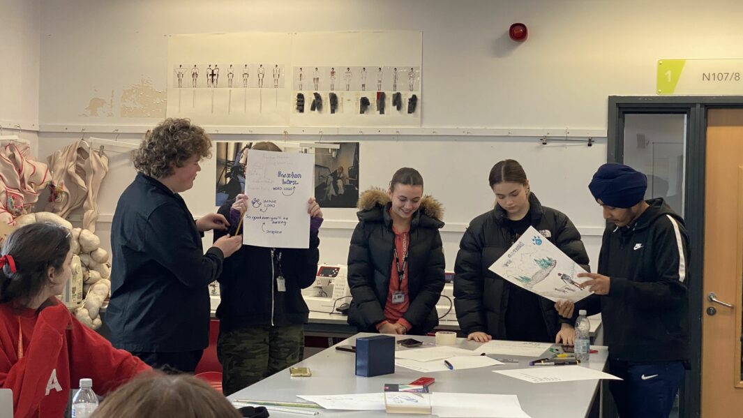 LCC workshop in the art department. Group of students and artwork