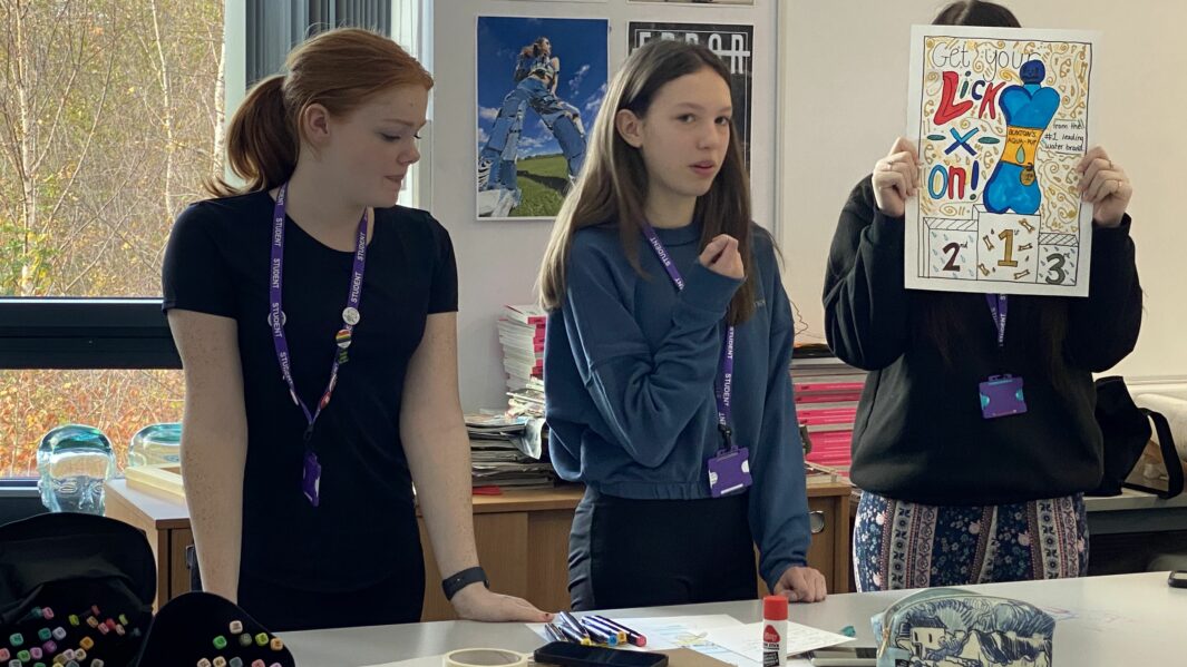 Female students doing an art workshop