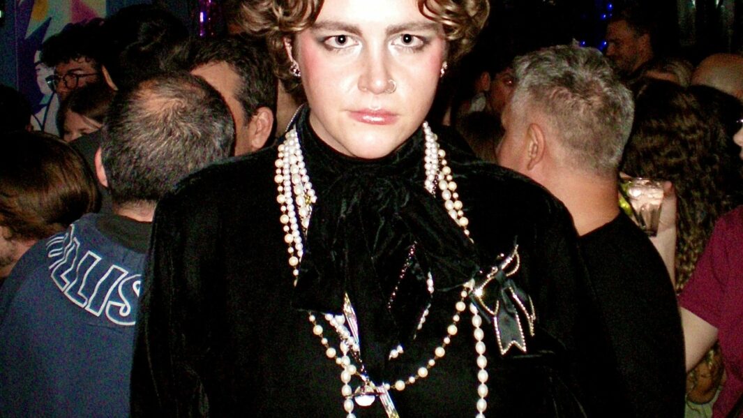 Student posing in nighclub