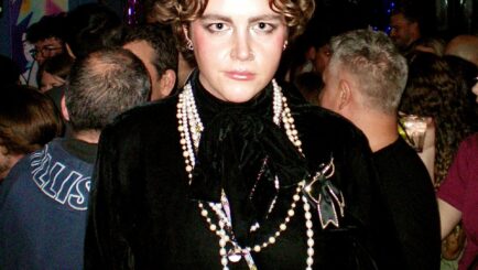 Student posing in nighclub