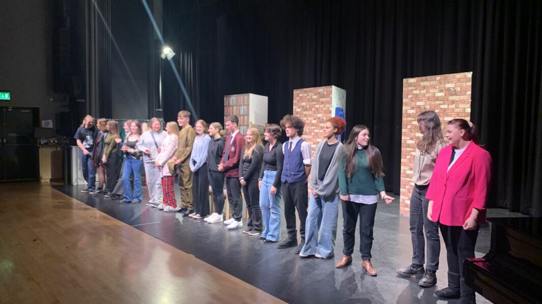 Performing Arts students stood in line bowing