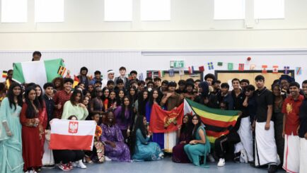 group of students in traditional dress for culture day