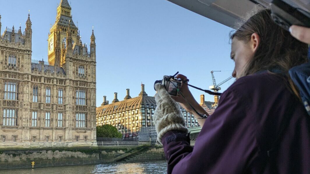 Student photographing the River Thames