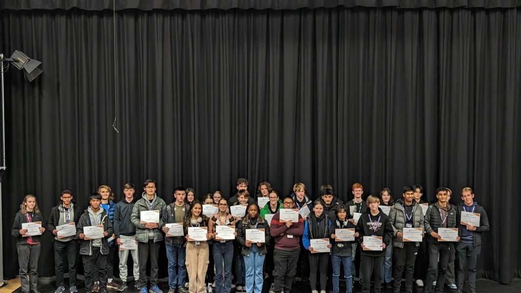 group of maths students with certificates
