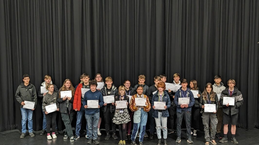 group of maths students with certificates. a level courses