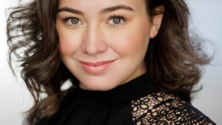 Head and shoulders photo of Eva Carroll