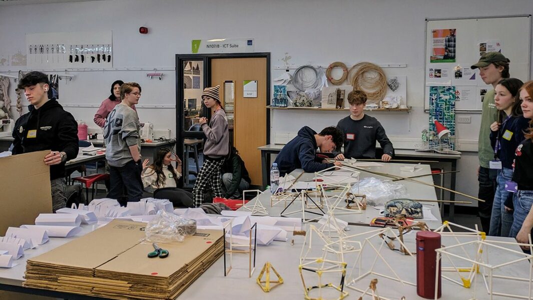 Art and Design students taking part in a design workshop ran by Place Education building a homeless shelter from materials in a classroom