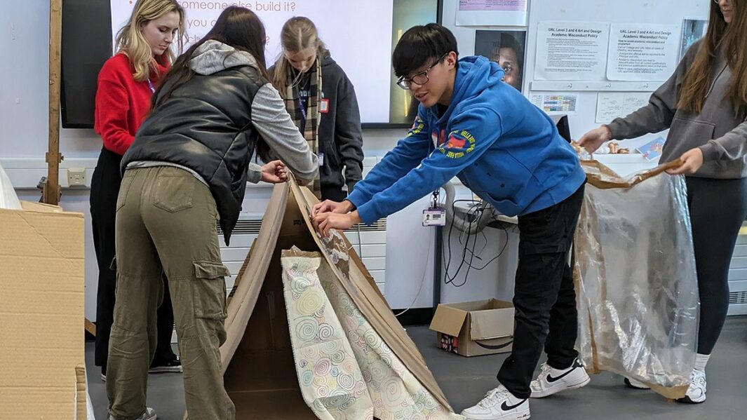 Art and Design students taking part in a design workshop ran by Place Education building a homeless shelter from materials in a classroom