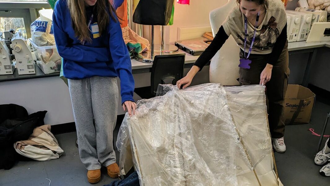 Art and Design students taking part in a design workshop ran by Place Education building a homeless shelter from materials in a classroom