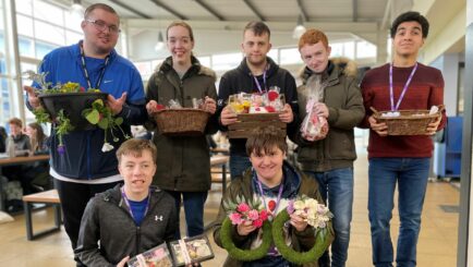 Group of Foundation Learning students with plants