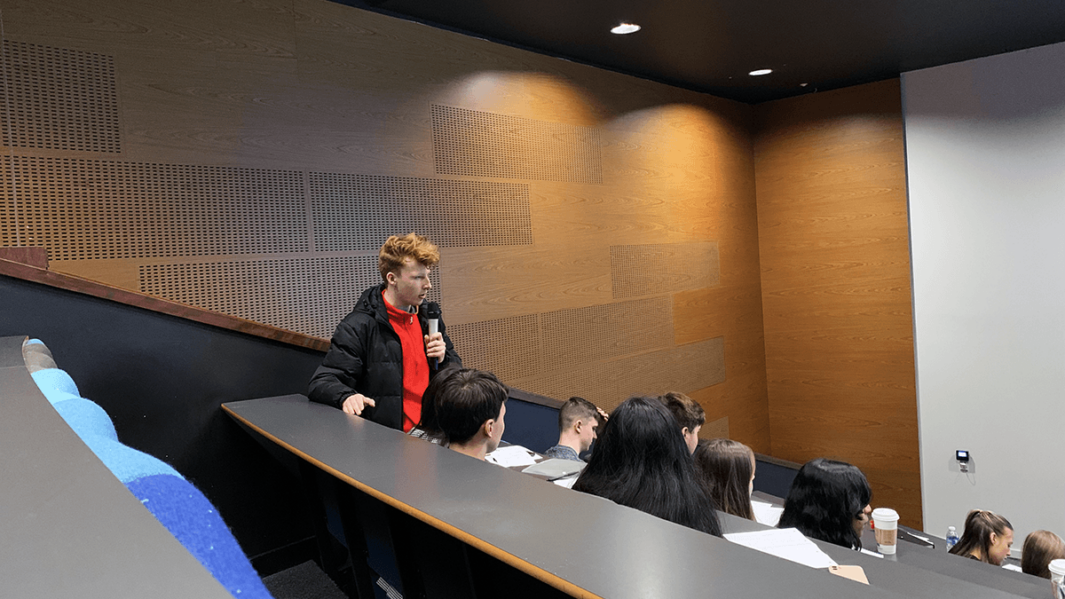 A Level Politics Carmel College student debates at European Youth Parliament regional finals at Liverpool John Moores University
