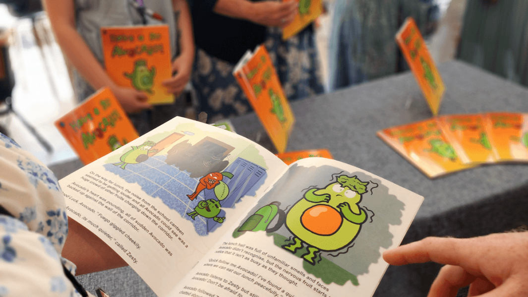 Councillor Jeanette Banks, Mayor of St Helens enjoys meeting the Foundation Learning student authors of Have A Go Avocado.