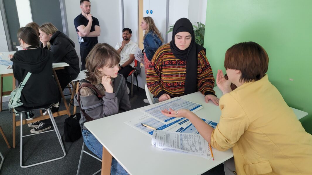 students working together at desks