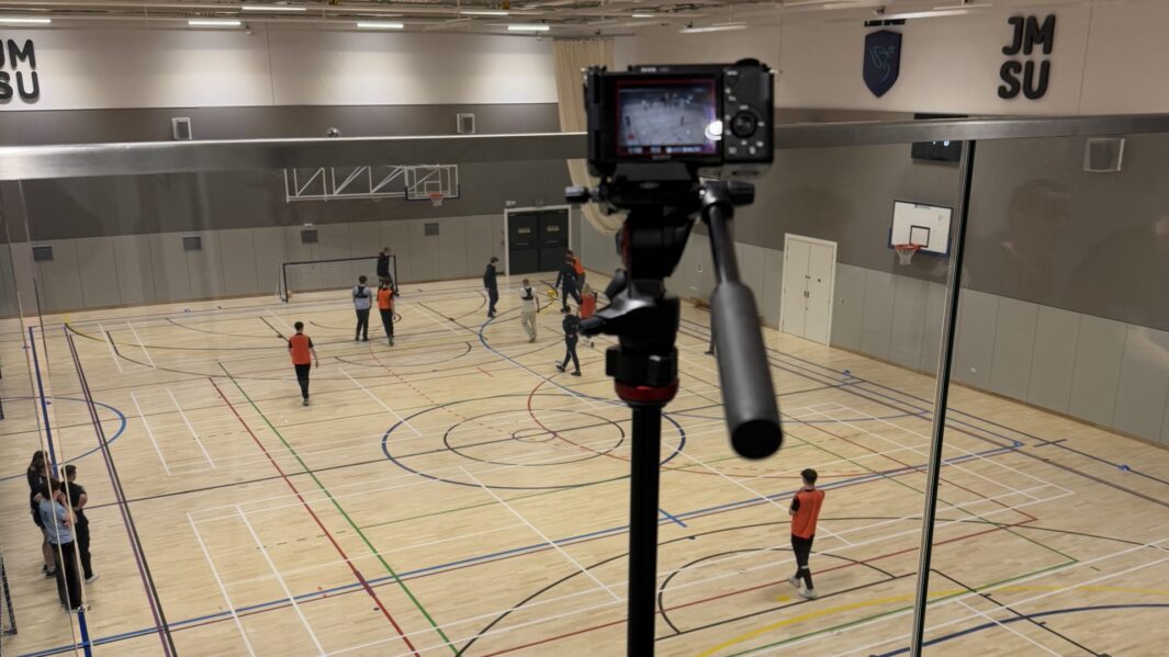 Camera set up to take a photo of a sports hall