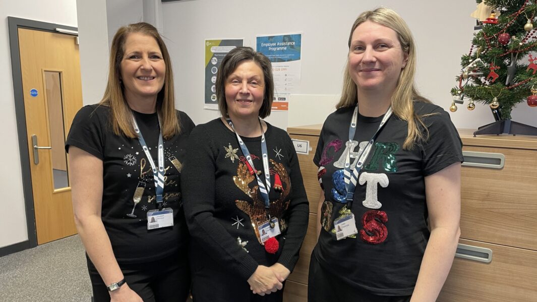 exams and admissions staff wearing xmas jumpers