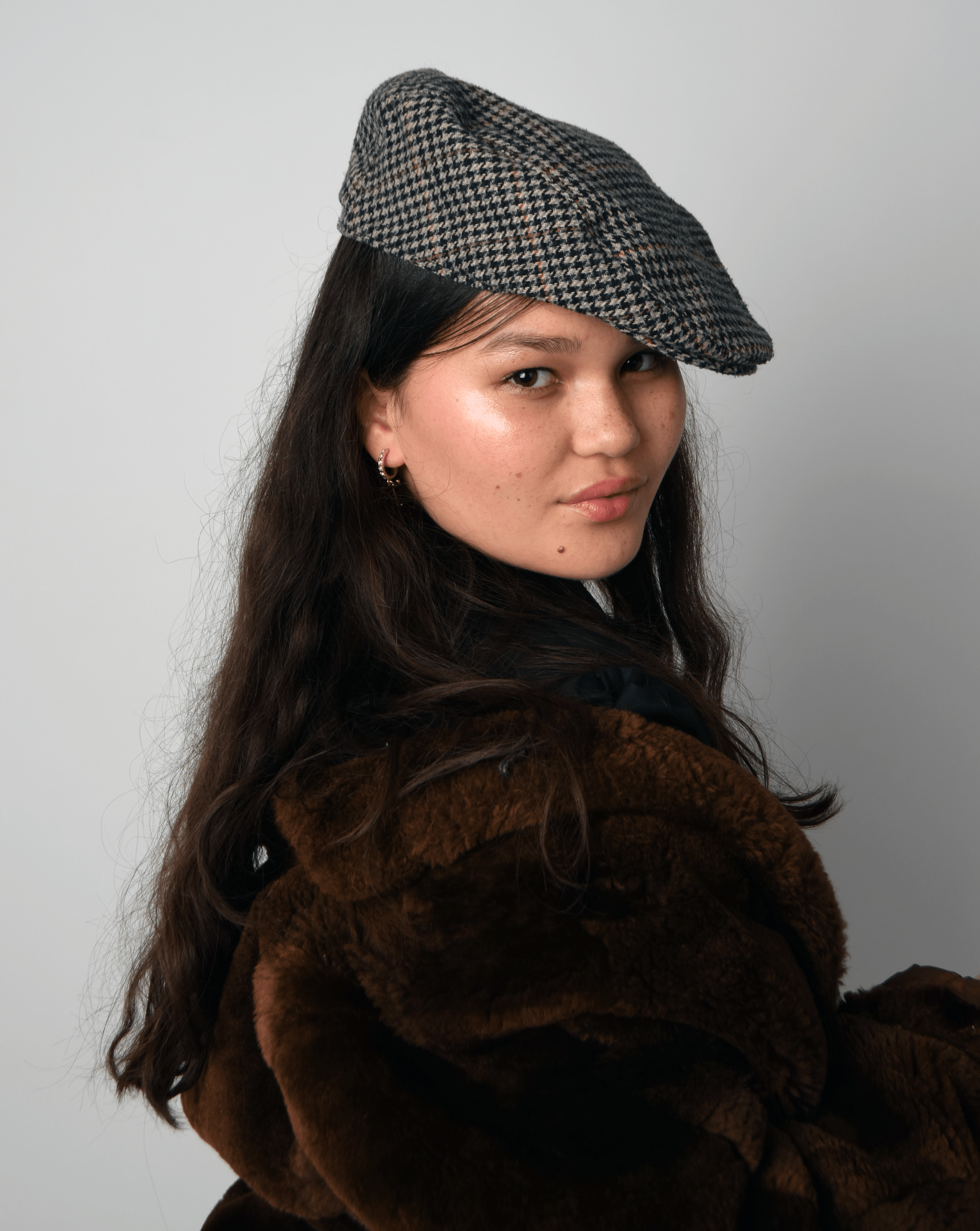 Female student poses for fashion photography shoot as part of Lorraine Wirecko-Brobby workshop.