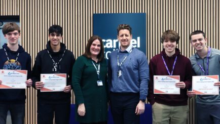 Four A Level Mathematics students receive certificates for completing the UK Mathematics Trust's highly prestigious Senior Kangaroo Maths Challenge