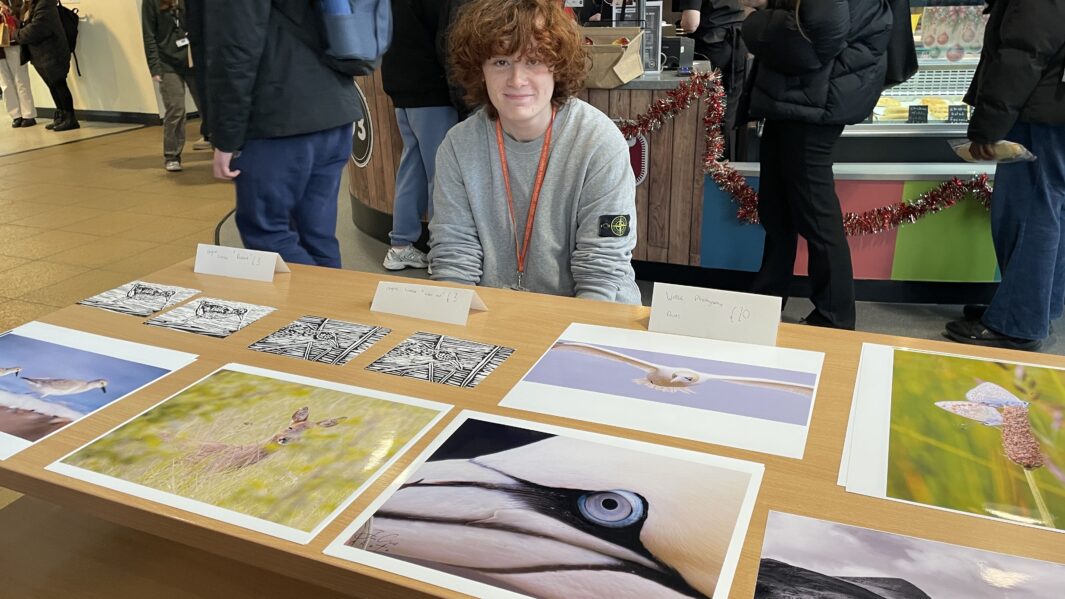 Photography student showcases work at Carmel Christmas Market 2024.