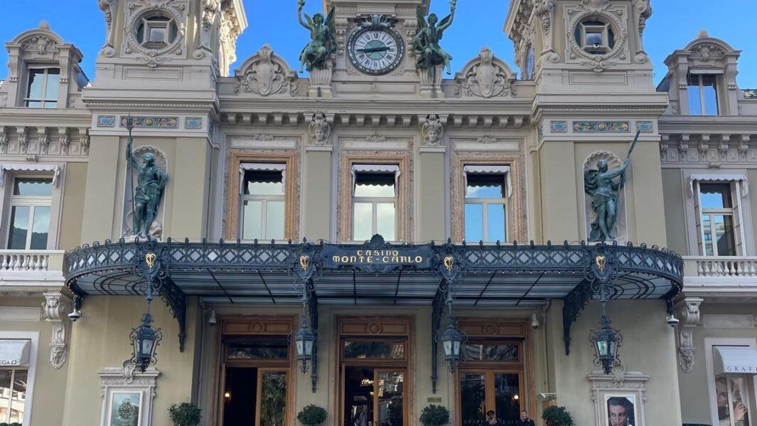 French students in Nice stood in front of a building