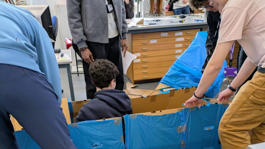 students in class working on architect projects