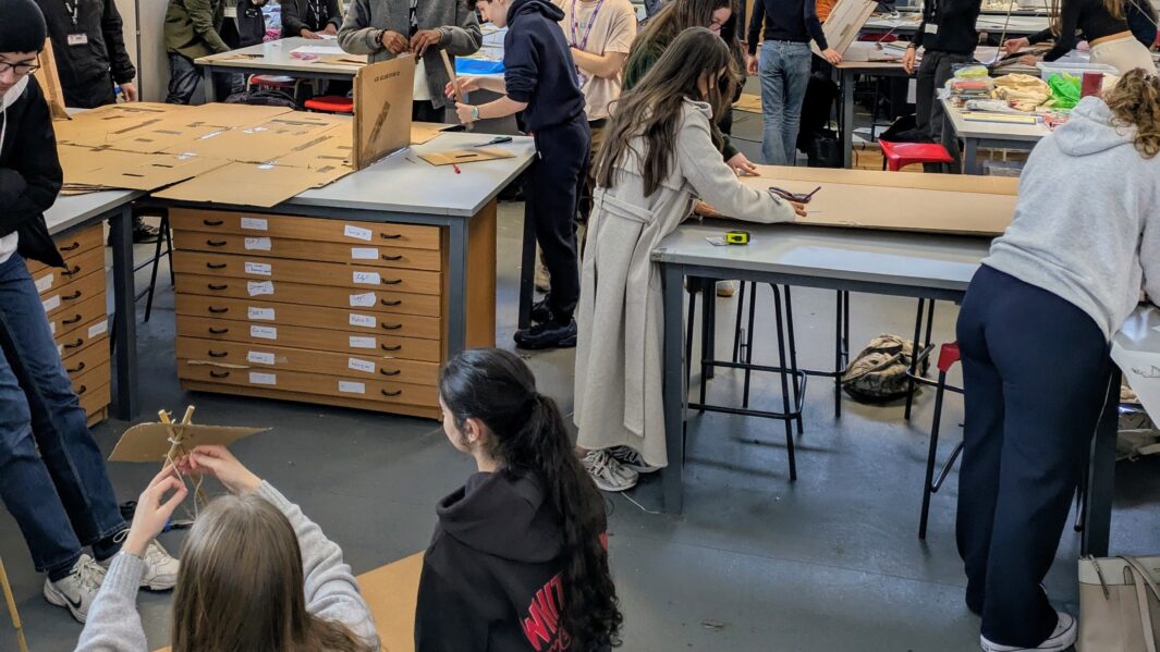 students in class working on architect projects