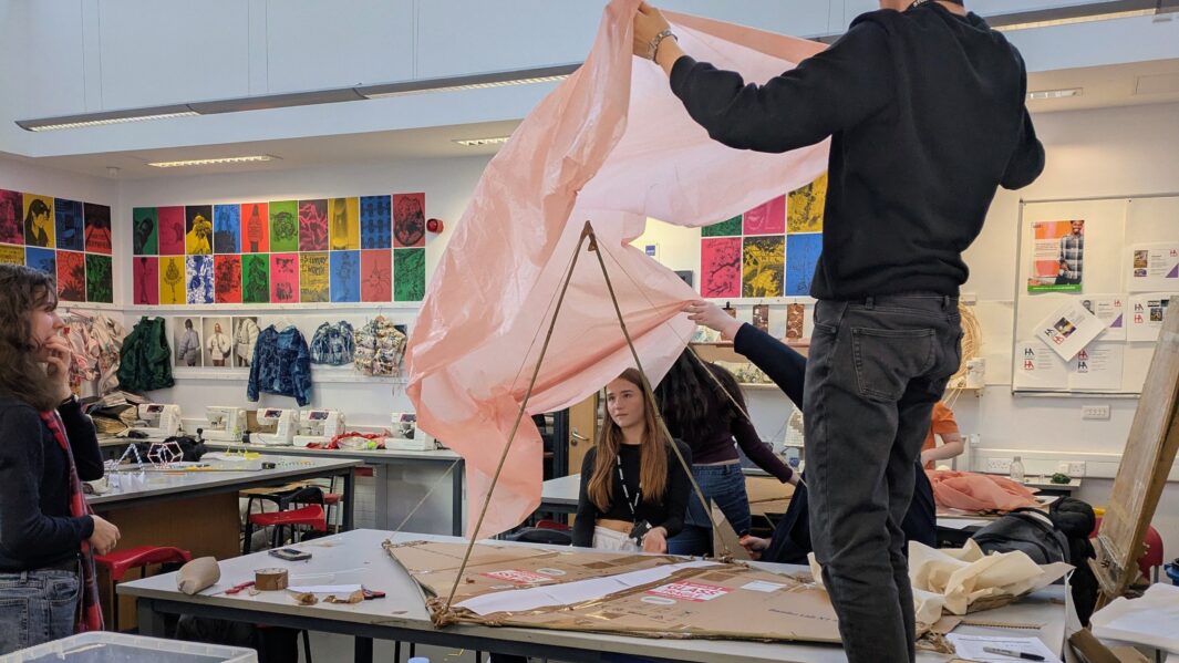 students in class working on architect projects