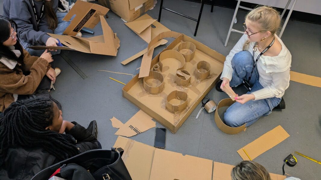 students in class working on architect projects