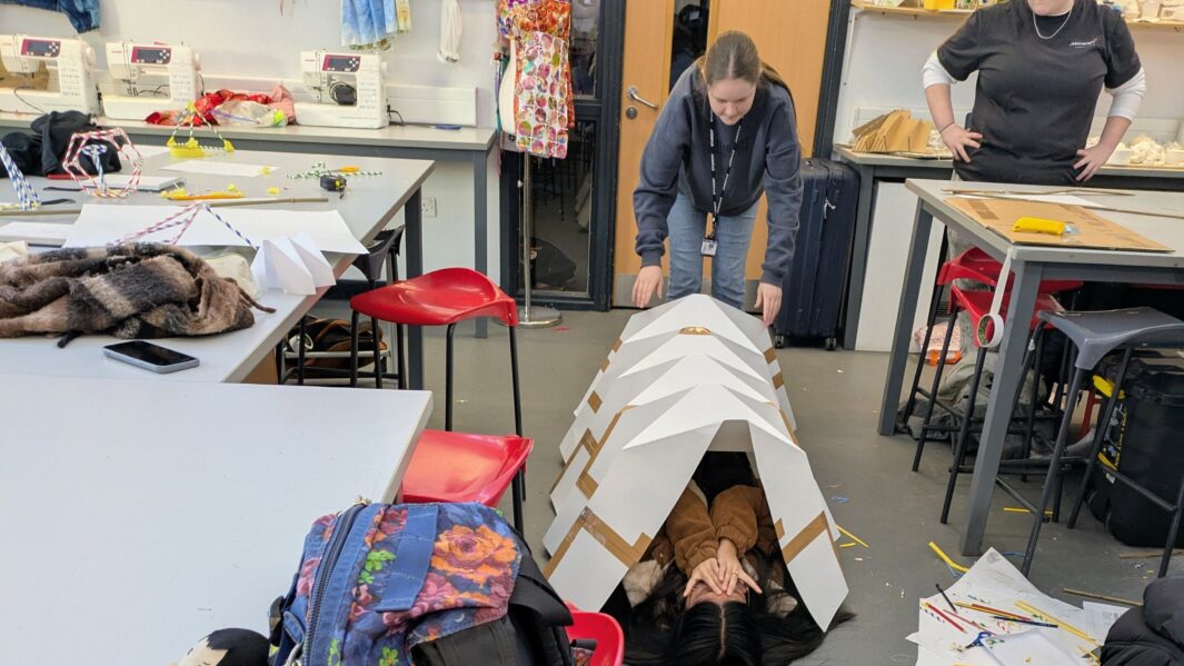 students in class working on architect projects