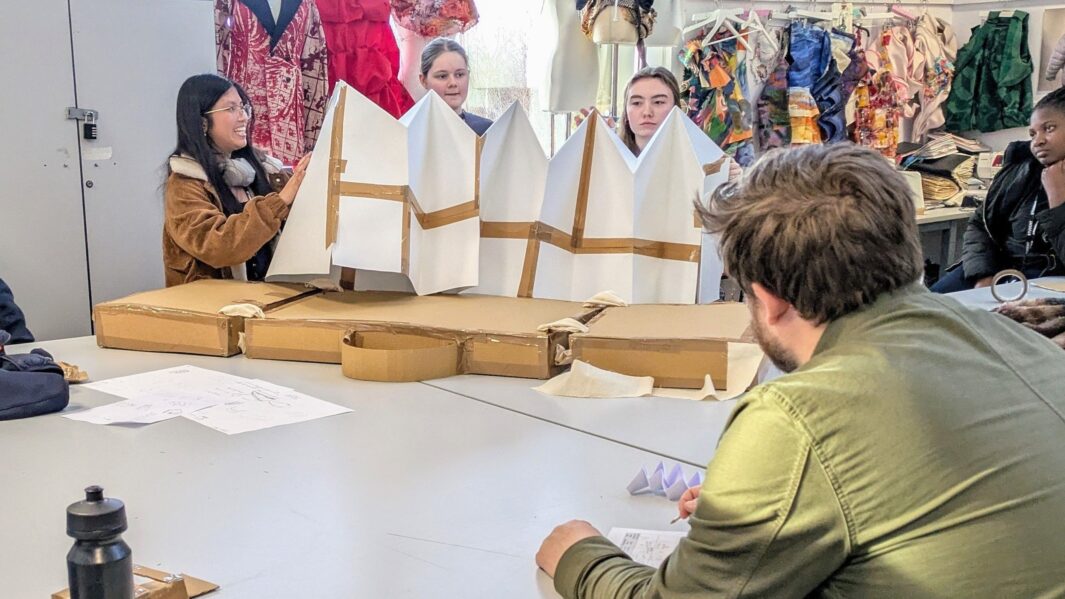 students in class working on architect projects