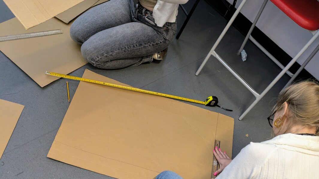 students in class working on architect projects