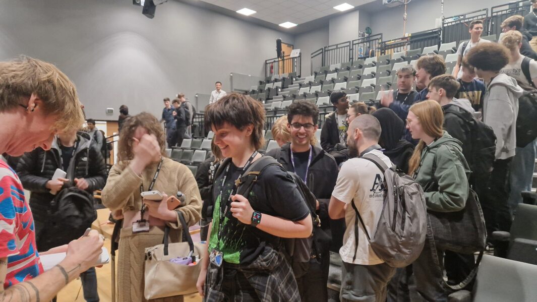 Dr Tom Crawford speaking to students in the Dalton Theatre