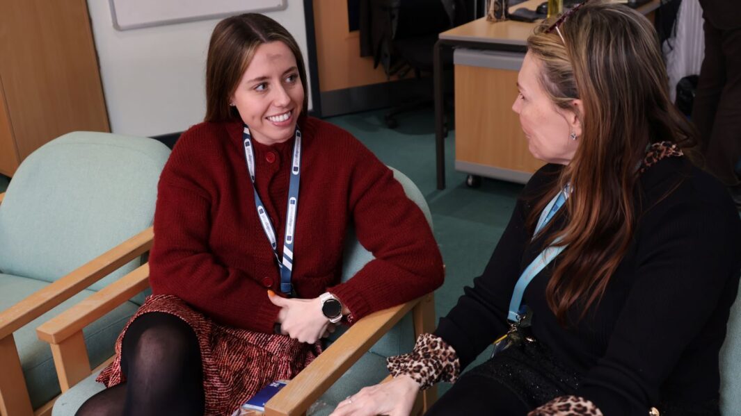 2 female staff members talking int he Chaplaincy