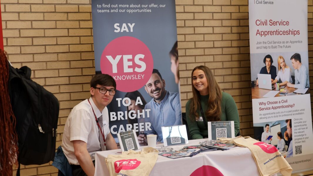 students talking to employers and universities at the careers fair