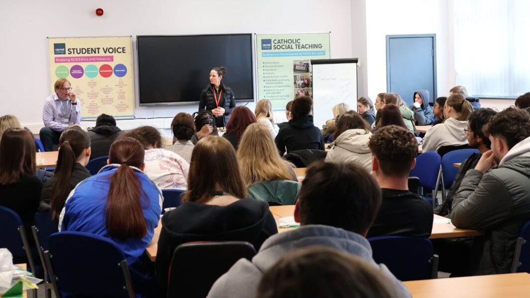 Claire Cockburn talking to to students in class