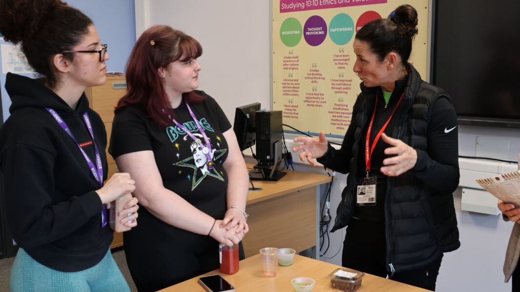 Claire Cockburn talking to to students in class